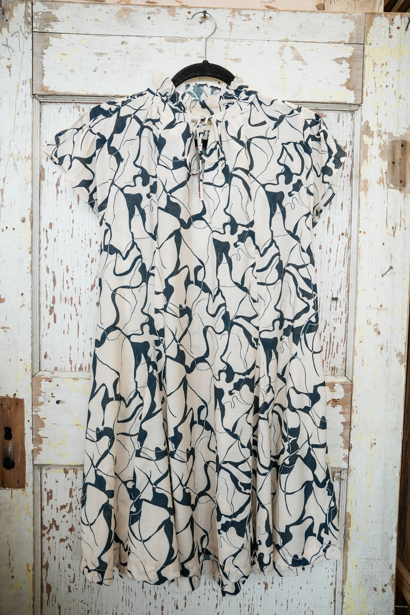 CREAM W/ NAVY DRESS