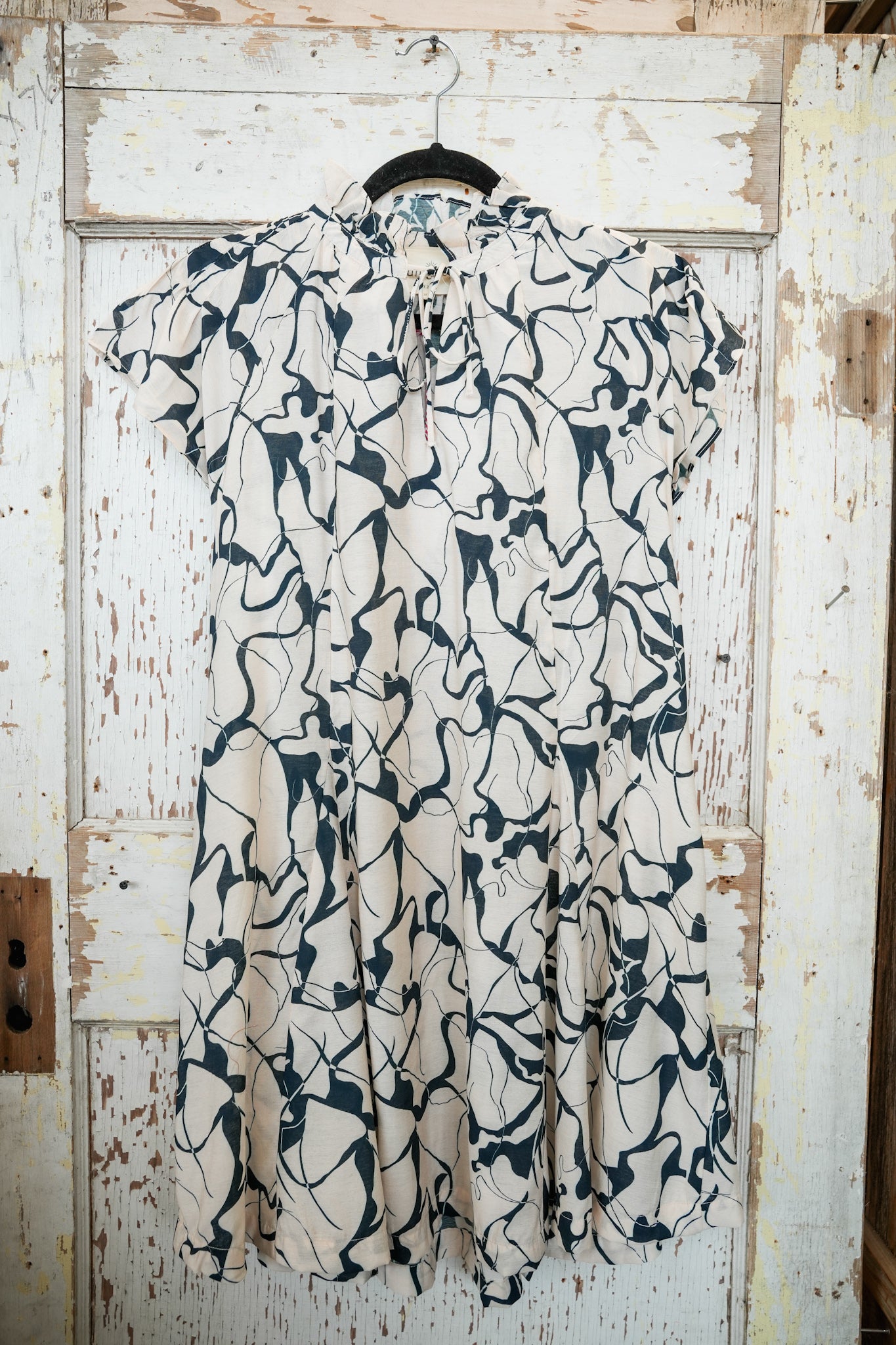 CREAM W/ NAVY DRESS